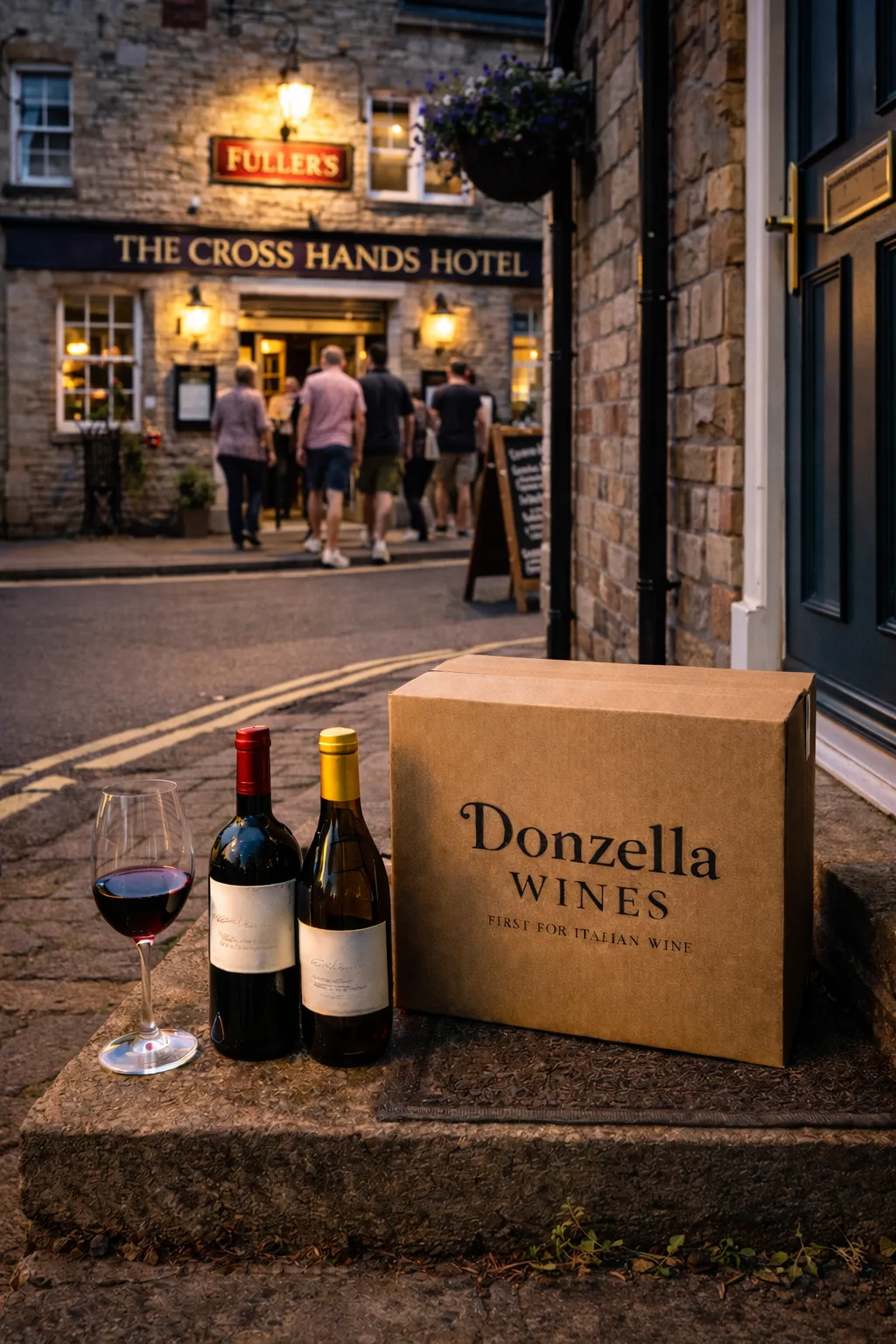 Wine delivery in Chipping Sodbury outside The Cross Hands Hotel showing Donzella Wines box